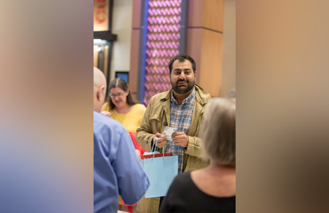 Tulalip Tribes’ 2018 Raising Hands photo of guest speaker with blue light.