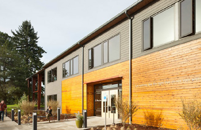 Looking at the front of the Navos two-story building.