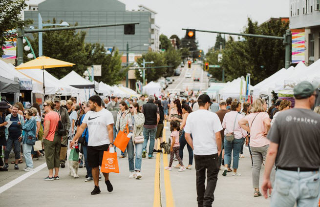 Crown of People participating in a Schack Art street fair 2023